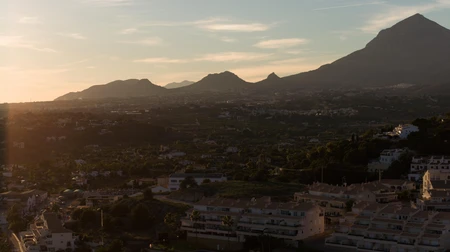 Sunset Over Mountain Town