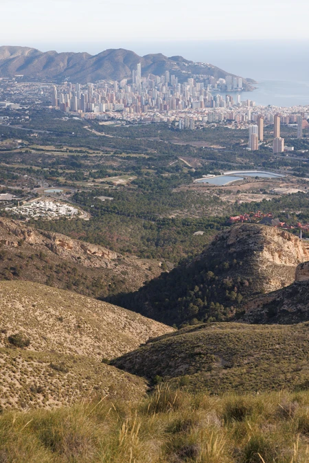 Scenic View of City and Mountains
