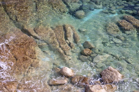 Rocky Shoreline Under Clear Water