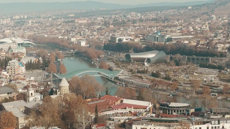 Cityscape with River and Bridge