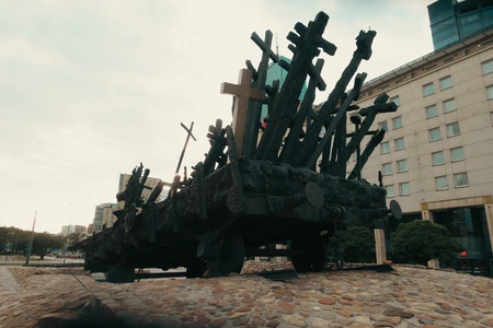 Dramatic Monument Against Urban Backdrop
