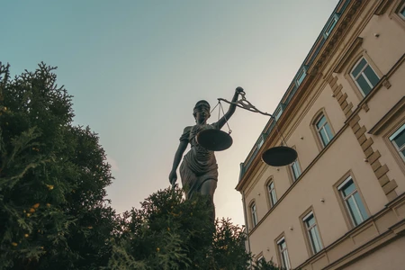 Statue of Justice in Urban Setting
