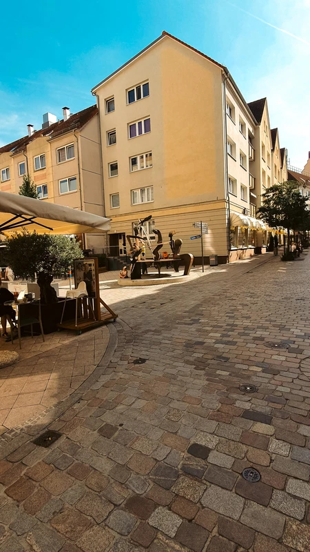 Sunny Cobblestone Street