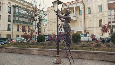 Street Lamp Statue in Urban Setting