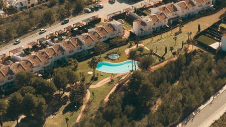 Aerial View of Residential Area with Pool