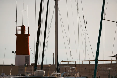 Harbor Lighthouse and Mast Silhouettes