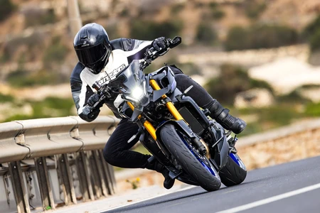 Motorcyclist on Curved Road