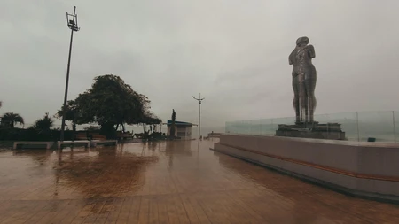 Rainy Promenade with Sculpture
