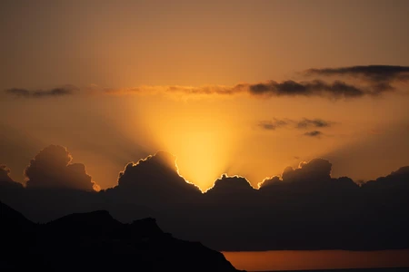 Sunset Behind Clouds