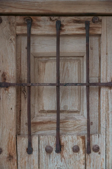 Rustic Wooden Door with Bars