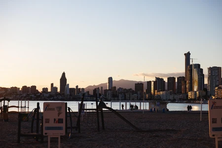 Beachfront City Skyline at Sunset