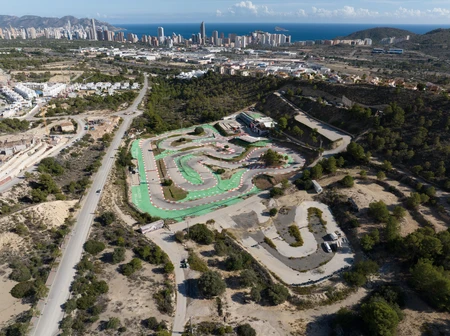 Aerial View of a Racing Track near Coastal City