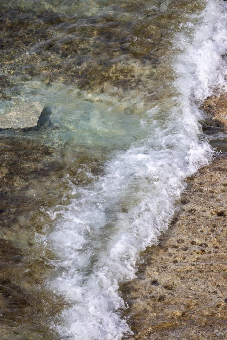 Coastal Wave on Rocks