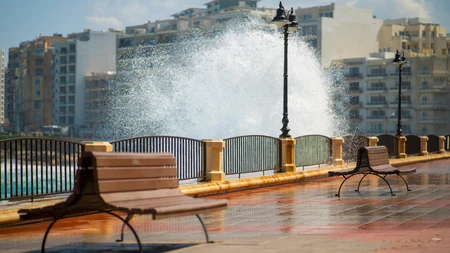 Seaside Promenade with Splashing Waves