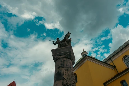 Historical Statue Against Dramatic Sky