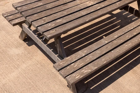 Wooden Picnic Table in Sunlight