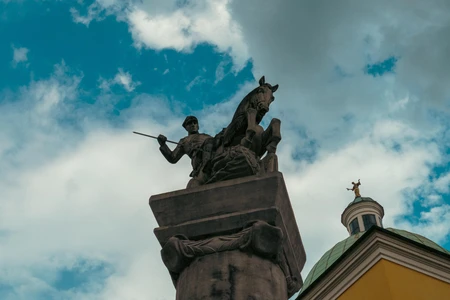 Statue Against a Cloudy Sky