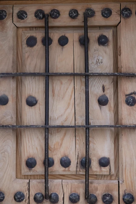 Wooden Door with Iron Bars