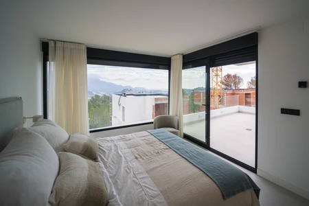 Modern Bedroom with Scenic View