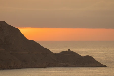 Sunset Over Coastal Cliffs