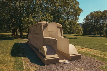 Stone Bus Sculpture in Park