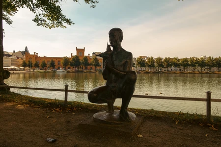 Tranquil Riverside Statue