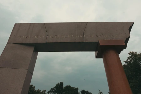 Modern Monument Under Cloudy Sky