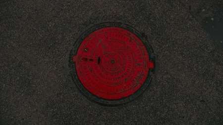 Red Manhole Cover