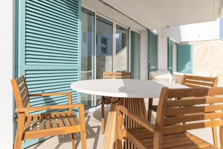 Sunny Patio with Wooden Furniture