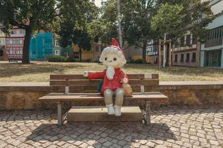 Park Bench with Sculpture
