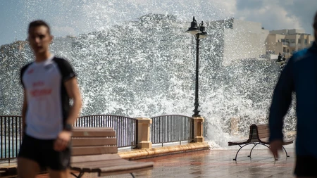 Coastal Walkway with Splashing Waves