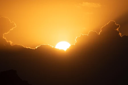 Golden Sunset Behind Clouds