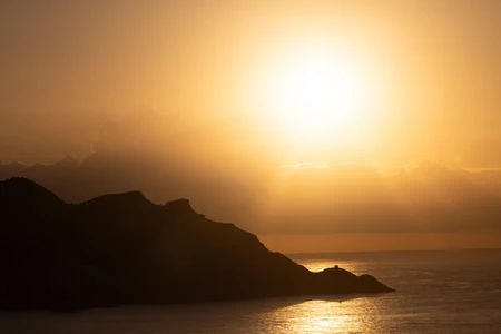 Sunset Over Mountain Range
