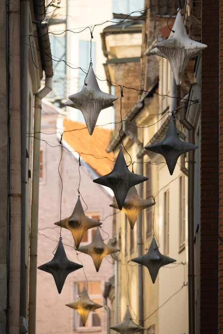 Hanging Star Decorations in Alley