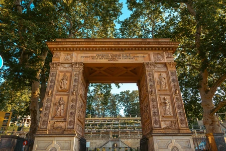 Historic Archway in a Tree-Lined Setting