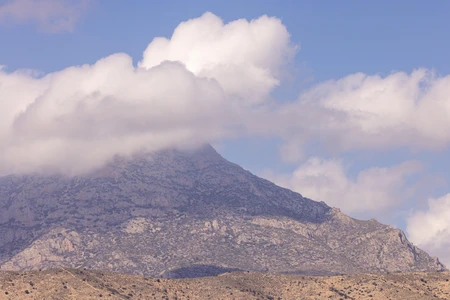 Mountain Peak Under Clouds