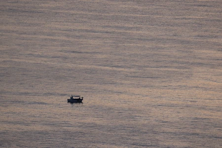 Solitary Boat on Calm Waters