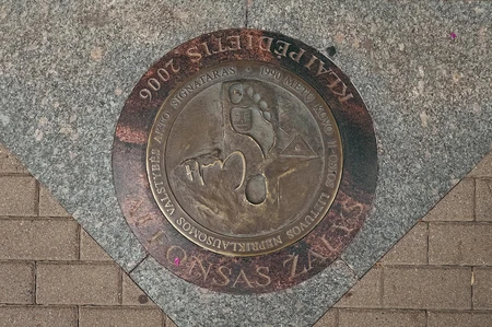 Commemorative Coin Embedded in Pavement