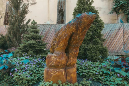 Garden Sculpture Among Greenery