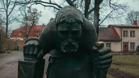Historic Atlas Statue in Quaint Setting