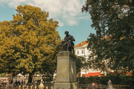 Statue in a Leafy Park