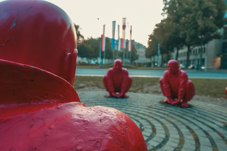 Red Sculptures in Urban Park