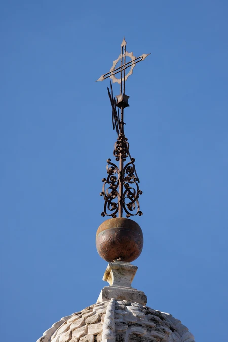 Intricate Church Spire Against Blue Sky