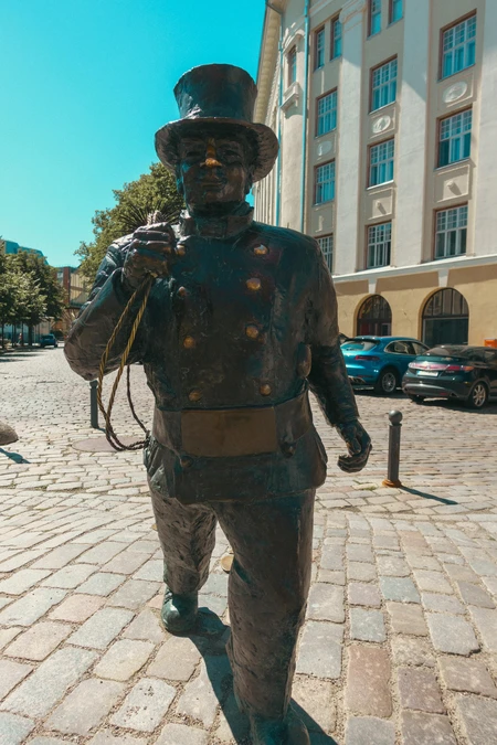 Statue on Cobblestone Street