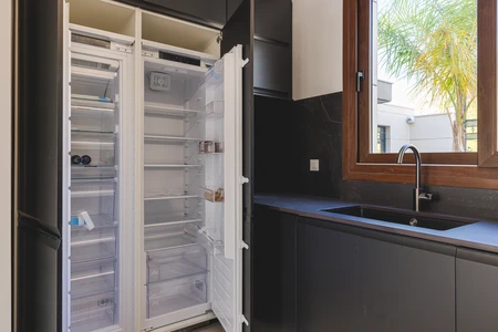 Modern Kitchen with Open Refrigerator