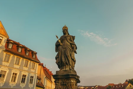 Ancient Sculpture in Cityscape