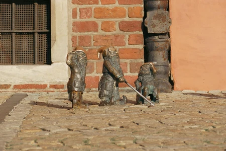 Charming Dwarf Statues on Cobblestone Street