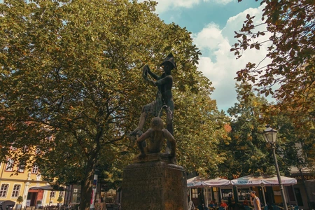 Statue in a Lush Park