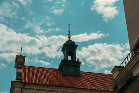 Historic Rooftops Under Blue Sky