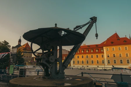 Historic Waterfront Crane at Sunset